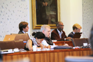 InfraReg Conference morning session audience listening attentively to panelists speak